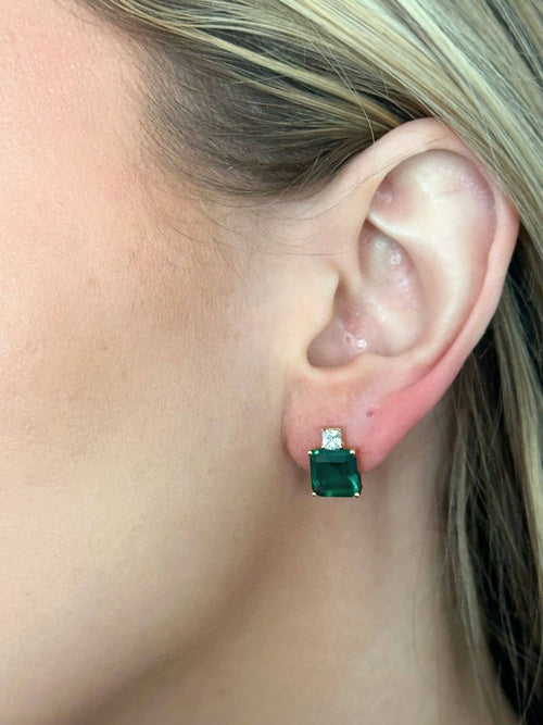 Model wearing the emerald green stud earrings