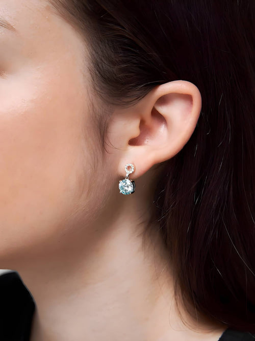 Model wearing the colorful 2 carat moissanite drop earrings in turquoise|Color:Turquoise
