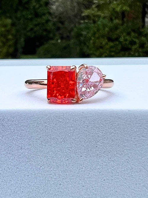 front view of the fiery red toi et moi ring