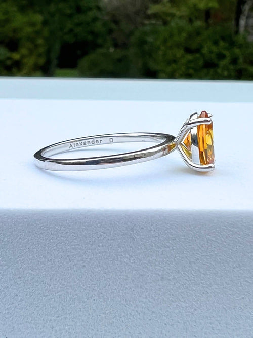 side view of golden sapphire ring