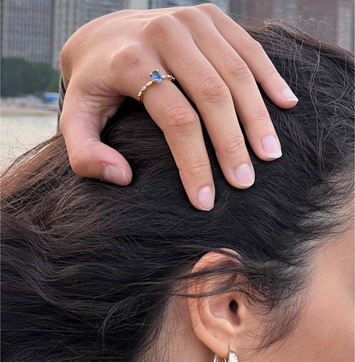Model wearing the ice blue sapphire ring