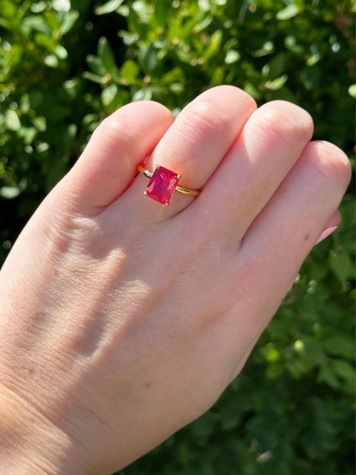 Model wearing the lab created ruby ring