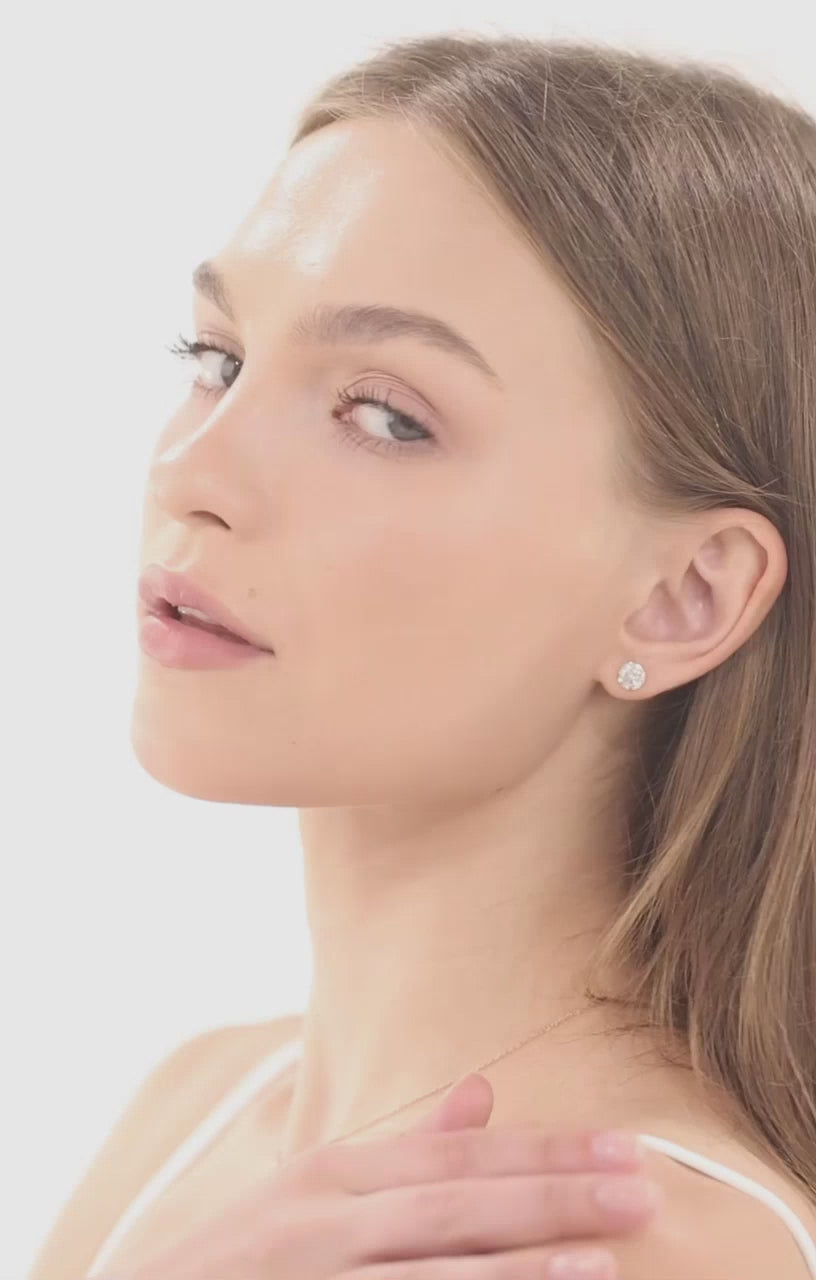 Model wearing the 1.3 carat moissanite stud earrings