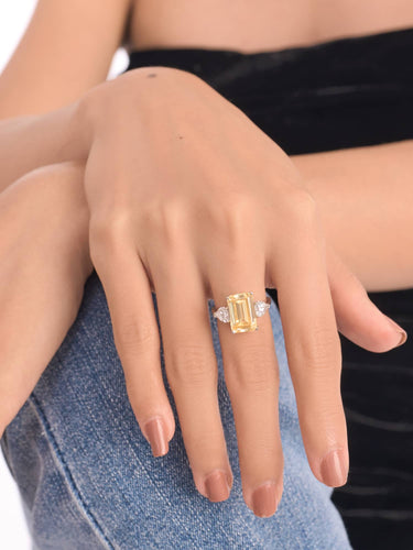 Model wearing the yellow gemstone ring