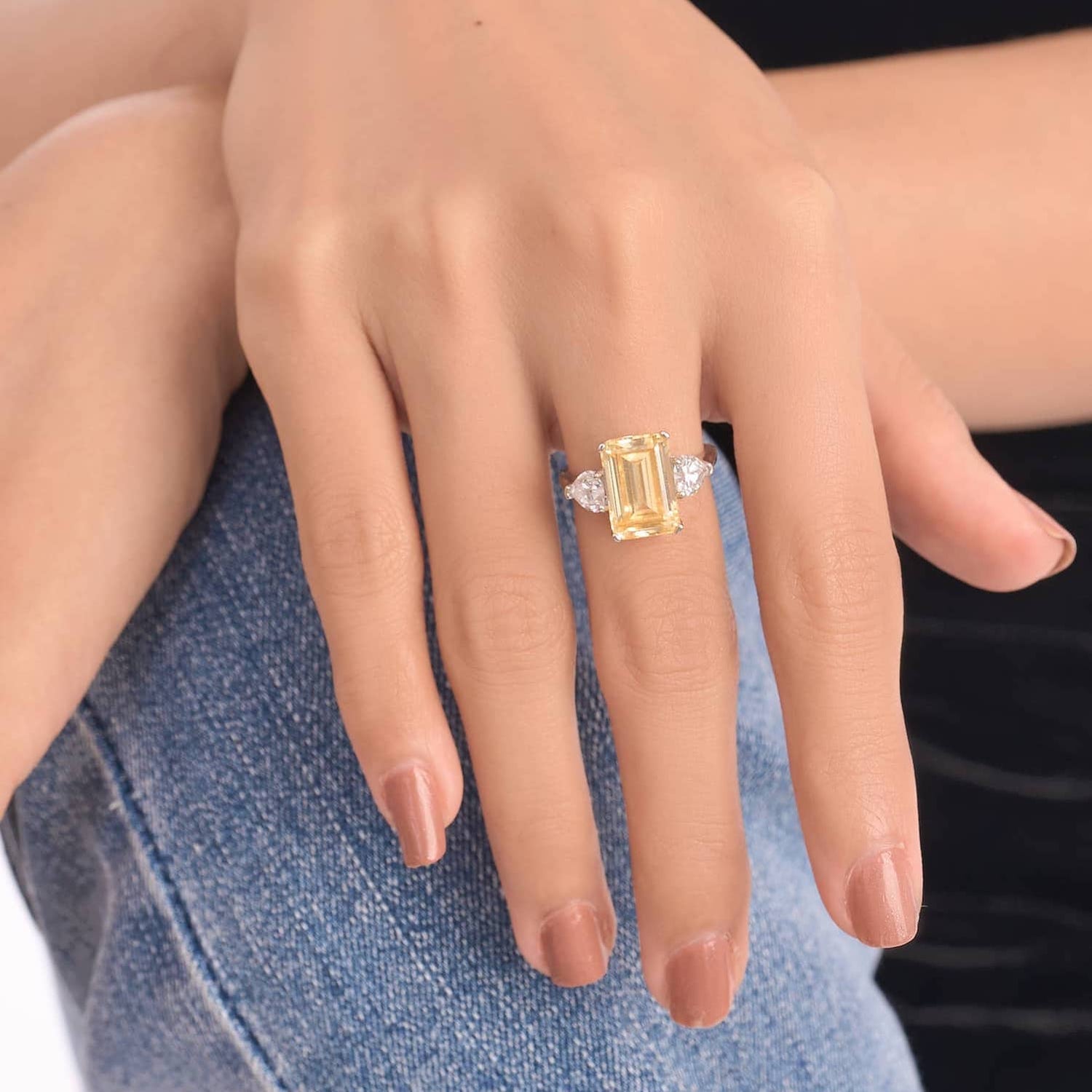Model wearing the 3 gemstone ring in yellow